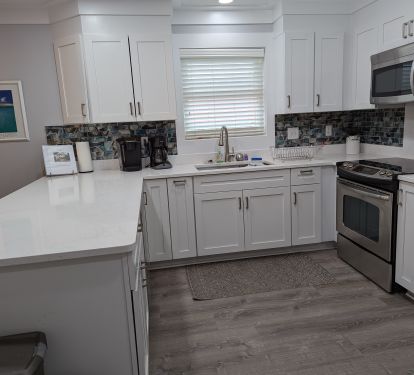 Kitchen with stainless steel applicances and all your cooking needs
