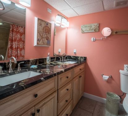 Double vanity w/new cabinets and granite counter tops.  Bath tub/shower