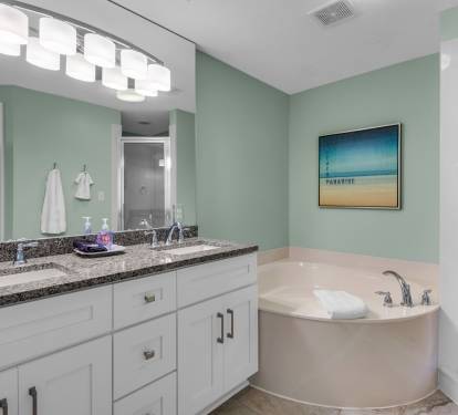 Master Bathroom has 2 sinks, Garden tub, Walk-in shower &amp; private commode room.