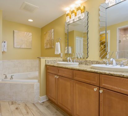 Classy new features accent the master bath, with a shower and jetted tub