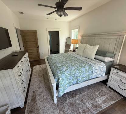Master bedroom with large attached bathroom