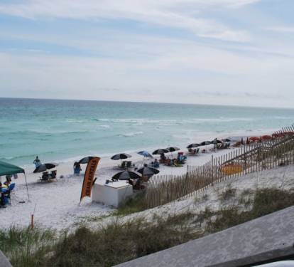Enjoy the beautiful white sand beach and emerald waters of the Gulf of Mexico