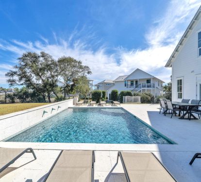 Heated salt water pool overlooking golf course