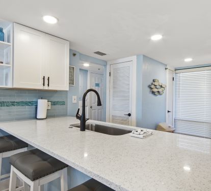 New kitchen cabinets, granite.