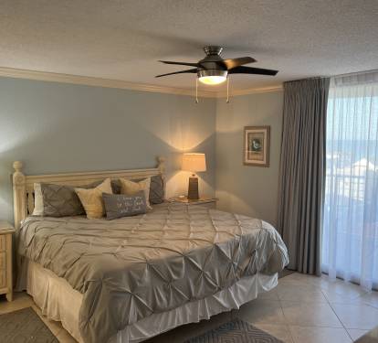 Master has a King bed and access to balcony 