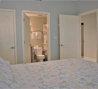 Bdrm 2 with a private third full bathroom.