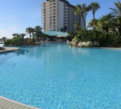 Lagoon pool with waterfalls, handicap access, hot tubs near by &amp; cabana rental