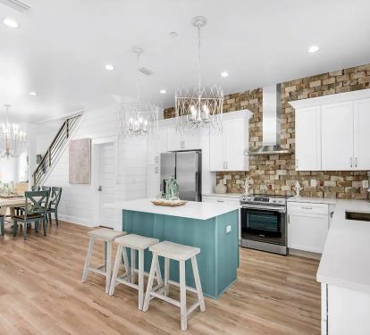 Windsong-13 features a beautiful quartz island seating for grab-and-go meals so that your family can make quick work of getting to the beach!