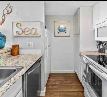 Kitchen is stocked with everything to cook with during your stay.