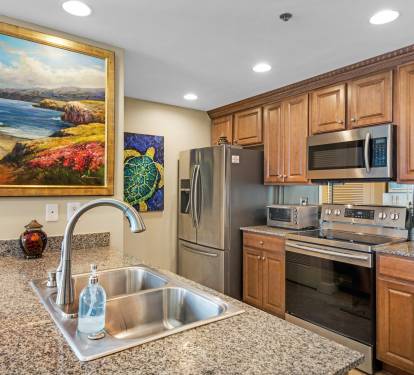 Granite Counters and Fancy Wood Molding in Kitchen