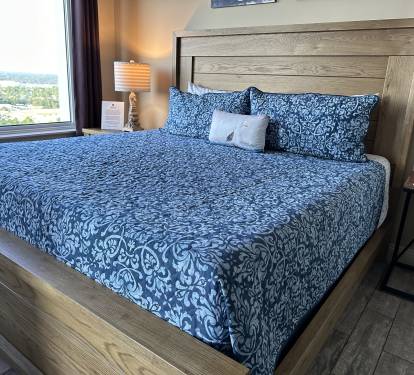 Ultra comfortable King Bed in Guest Room with private balcony and views of bays