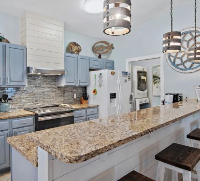 Kitchen with bar height seating.