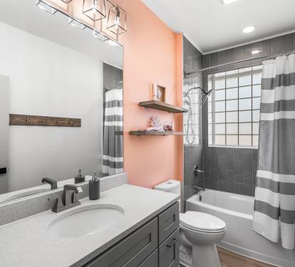 Spacious guest bathroom, large vanity and extra wide width shower/tub combo