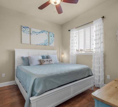 King Bedroom #2 with dresser and smart TV