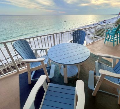 Pollywood Captain Chairs &amp; Tables on our wrap around balcony with Gulf view