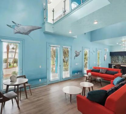 Aqua-2  Decorated with circling sharks, curious turtles and friendly dolphins....Aqua is the below the sea living experience!