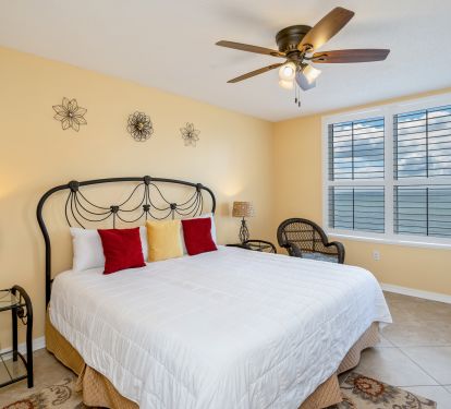 Master Suite with a SWEET view of the ocean from master and access to balcony