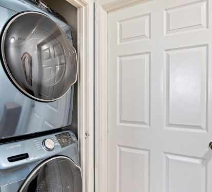 Full size washer and dryer in unit