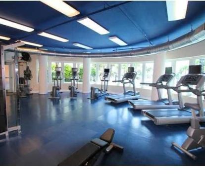 state of the art fitness room overlooking the pool.