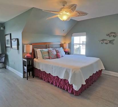 upstairs king master 2 with covered ocean view balcony and ensuite bath