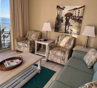 Living room with access to balcony overlooking the beautiful beach and Gulf.