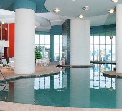 Heated In-door Pool area w/ 2 Over-sized Hot Tubs, &amp; Steam Room &amp; Sauna Room