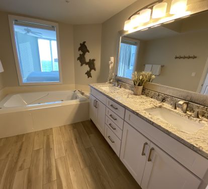Bdrm 1- Large master suite, pass through gulf window with full privacy shade.