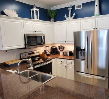 All new appliances with a huge refrigerator and freezer compartment.