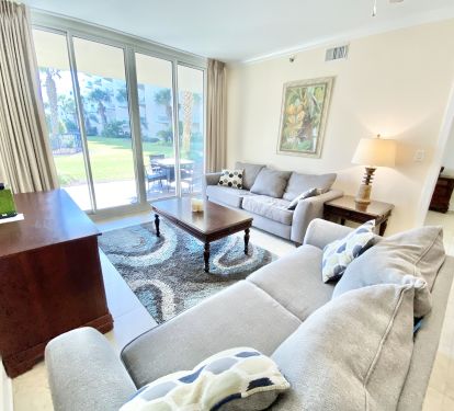 Large living room area with queen pullout couch. 