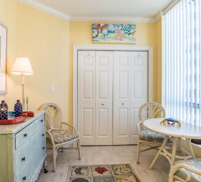 Cozy Breakfast Room and Laundry Closet with Full size washer and dryer.