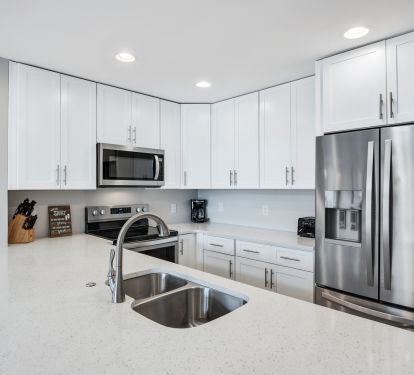 Expansive kitchen with new SS appliances