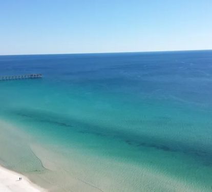 Beautiful view of Gulf of Mexico, pristine beach, and the pier from the balcony