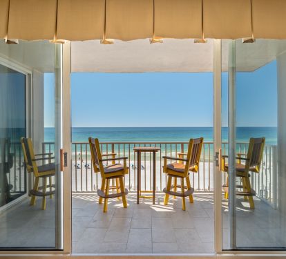 Bring the outdoors indoors with the large bank of windows and slider doors