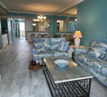 Newly installed porcelain tile flooring throughout the unit.  Family Room features queen size pull-out sleeper sofa.