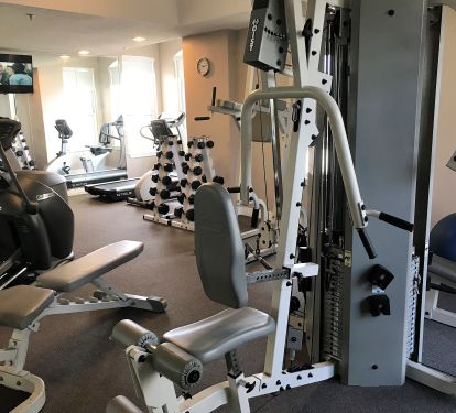 Free Air Conditioned Workout Room is Well-Equipped and offers views of the Beach