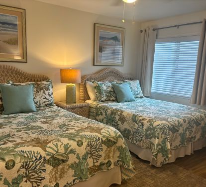 Beach quilts, blinds, blackout drapes, &amp; ceiling fan ensure a good nights sleep.