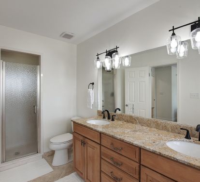 Large upper level bathroom with walk-in shower.