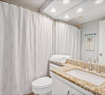 Second bathroom with shower/tub combo