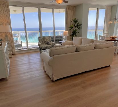 Comfy slip covered sectional, upholstered ottoman &amp; 75 inch Ultra 4K Roku TV