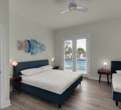 Aqua-20 The upstairs king en-suite with private balcony offers an in room twin for little ones that may not be quite ready for sleeping on their own.