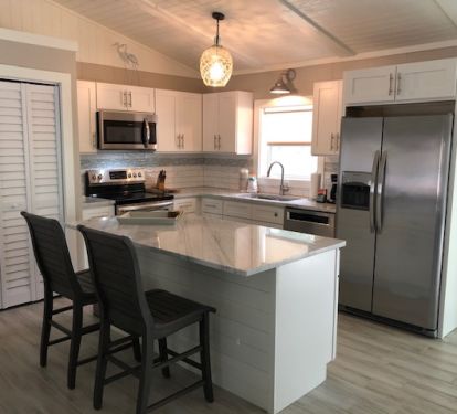 Fully Complimented Modern All New Kitchen with Island Seating