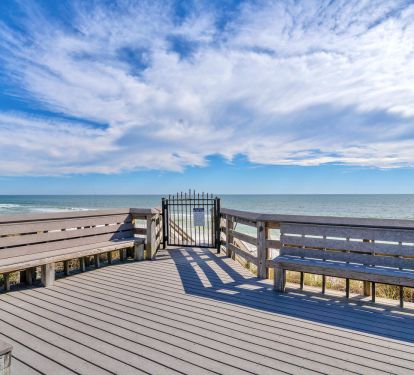 Deck seating overlooking the beautiful beach