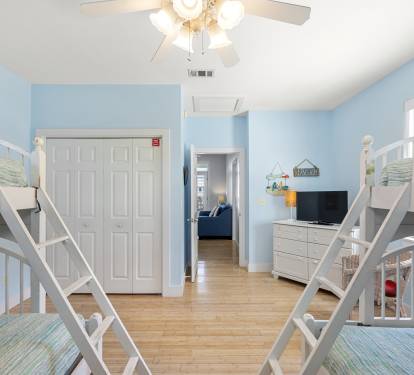 Bunk room features 2 full beds and 2 twin 