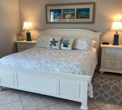 King Bedroom with walkout to patio, private bath, walk-in closet,