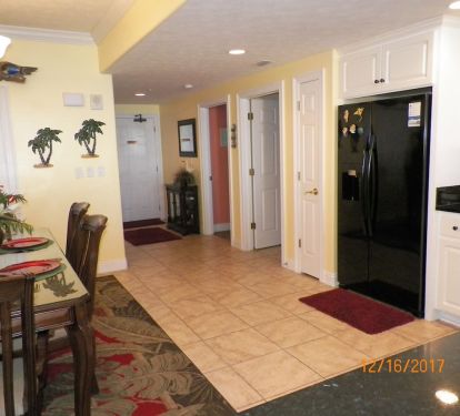 A VIEW FROM THE KITCHEN LOOKING TOWARD THE CONDO FRONT ENTRANCE