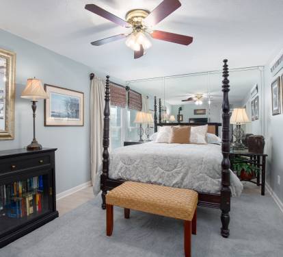 Beautiful master bedroom with comfortable queen bed.