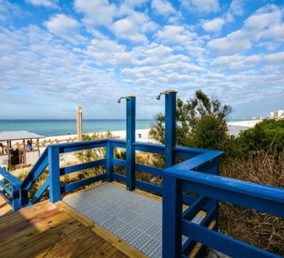 Beach walkover with outdoor showers and easy access to the white sand shoreline