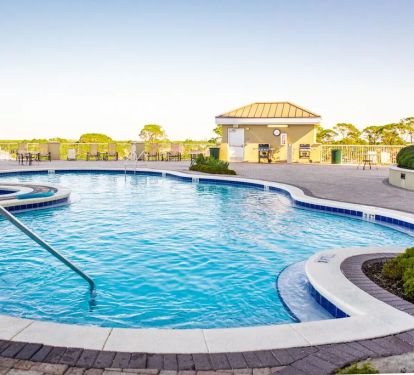 Tower 2 Pool Deck has heated pool and Jacuzzi plenty of room for R&amp;R