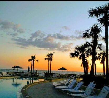sunset at 1 of the 3 pools