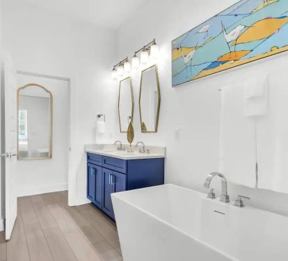 Nautilus-18 Bedroom 1 bath, pic 1. 1st floor. King with private bath. Freestanding tub, full walk-in shower, double quartz vanity.